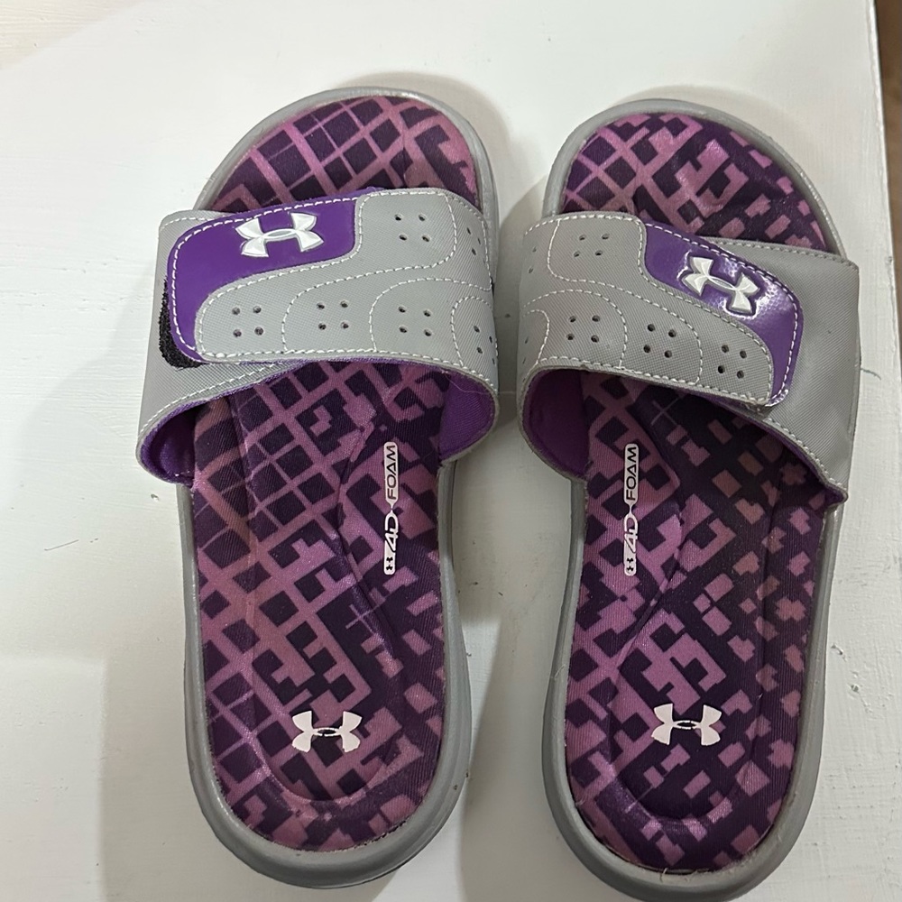 Purple and gray women’s under armor slides